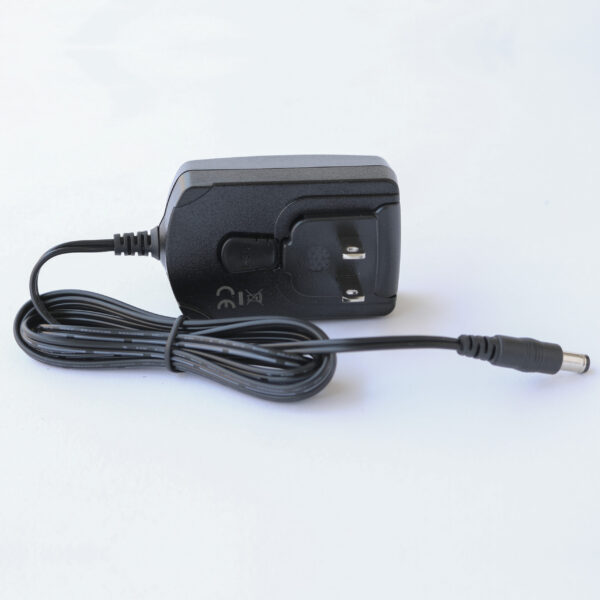 An AC Charger i n Black Color With a Wire